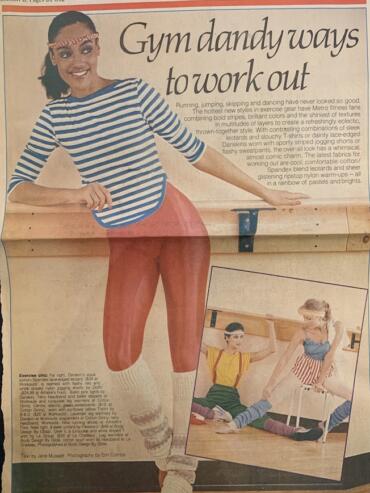 Woman in striped top and red leggings stretching in fitness class, 1982.