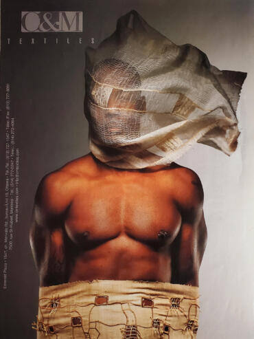A muscular torso with a fabric head wrap and an intricate woven waistband.