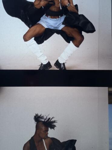 Fashion-forward male model with dynamic poses, wearing shorts, knee-high socks, and combat shoes.