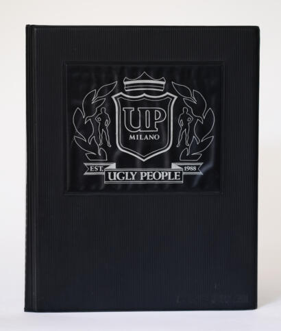 A black binder featuring a sleek, modern logo with "Ugly People" and "UP Milano" text.