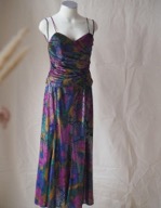 Colorful floral maxi dress on display mannequin