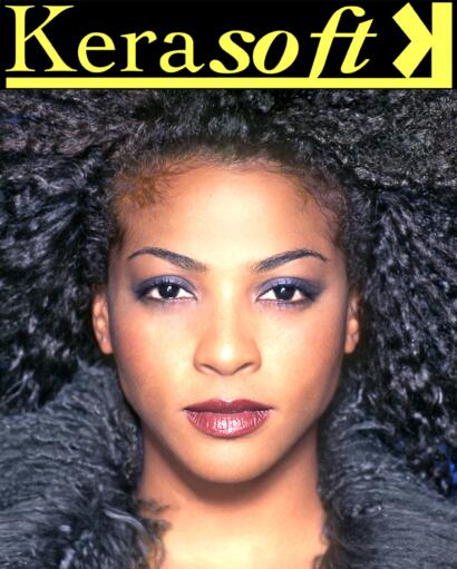 Close-up of a woman with curly hair, makeup, and a fur coat on Kerasoft magazine cover.