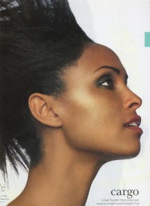 Profile of a woman with styled hair and natural makeup, facing right.