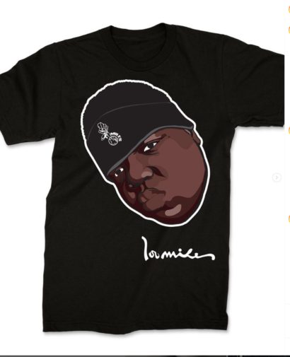 Black T-shirt with a graphic illustration of a person's face wearing a beanie, signature text at the bottom.