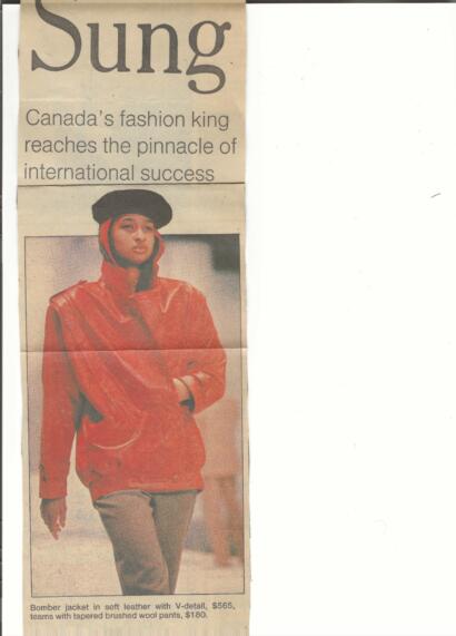 A woman wears a bold red bomber jacket with a black hat, featured in a fashion article.