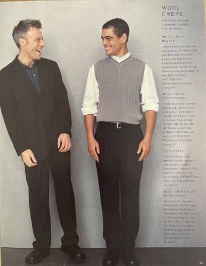 Two men in professional attire, showcasing wool crepe blazers and pleated pants.